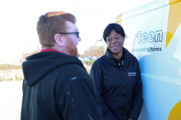 Members of the repairs team stood next to Thirteen van