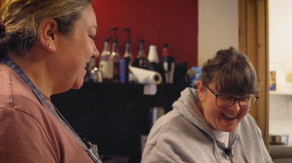 Left to right: Sharon Ackroyd And Rachel Heads Working At Flavours Coffee House. Women smiling naturally whilst chatting