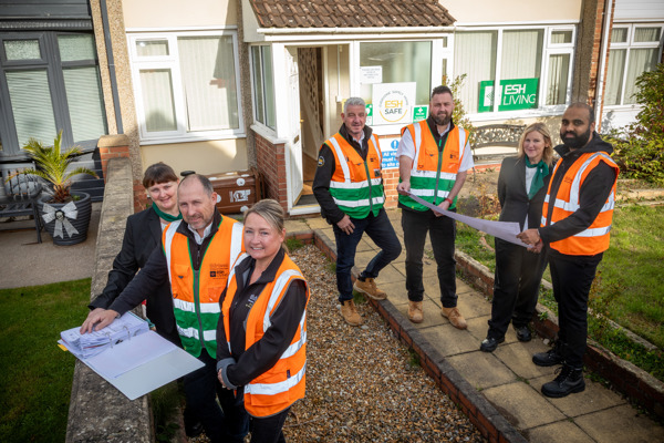 Contractors standing outside property in Throston Grange, Hartlepool