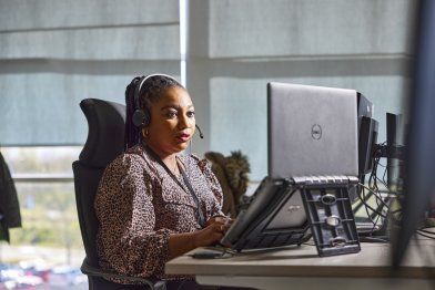 Customer Service Touchpoint Advisor Taking Customer Call And Looking At Computer At Hudson Quay Nnenna Emefesi 2