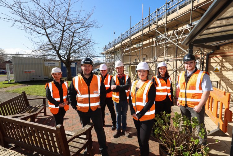 Colleagues and contractors at Bellamy Court