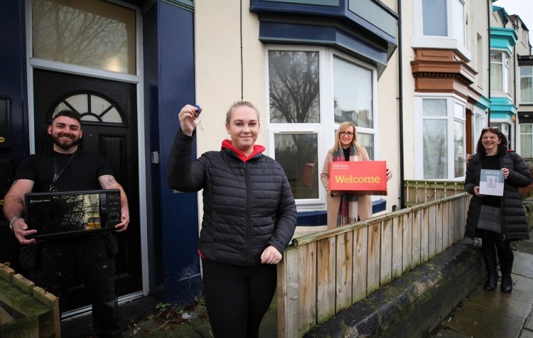 Customer and staff outside home