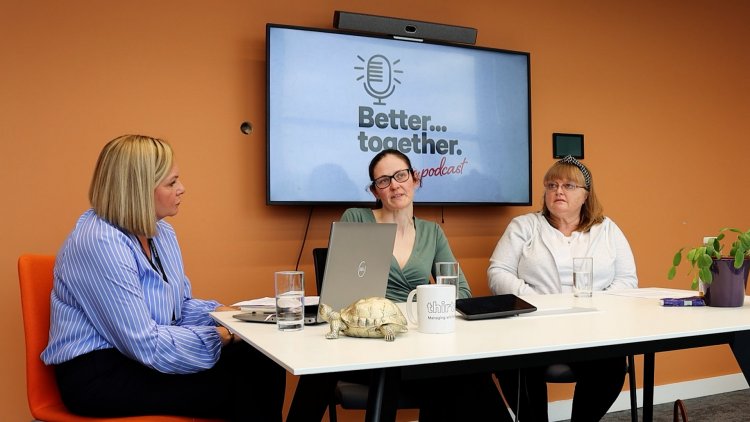 Involved customers and colleagues talking on a podacst